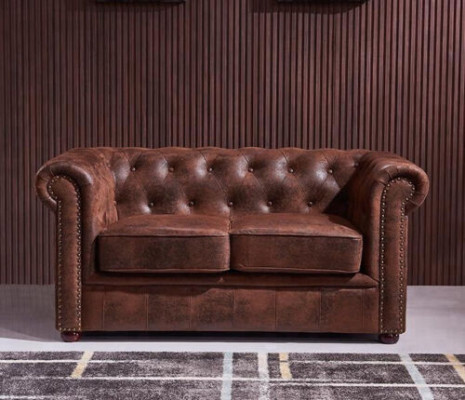 Canapé Chesterfield luxueux en cuir synthétique pour le salon
