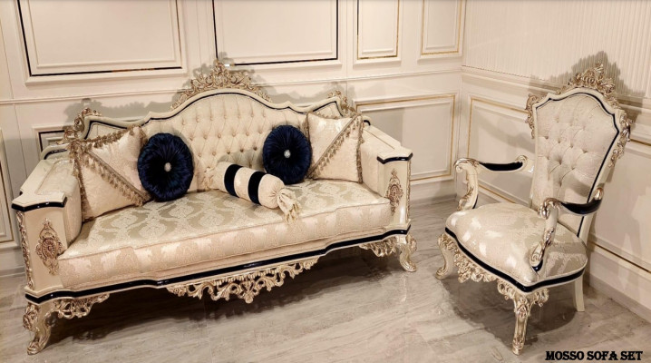 Un fauteuil raffiné et classique de couleur beige de style Chesterfield