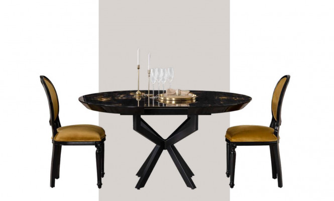 La table ronde de salle à manger au design sombre est composée de bois. Nouveau modèle pour la salle à manger.
