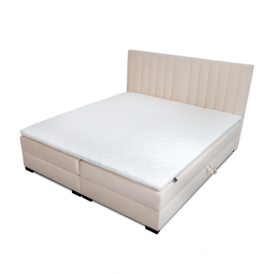 Un lit confortable et fonctionnel est fabriqué avec des matériaux de haute qualité dans un style moderne.