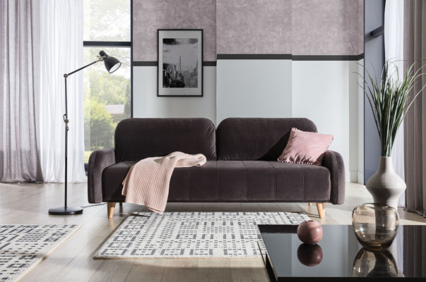 Le luxueux grand canapé-lit est fabriqué en matériau de haute qualité.