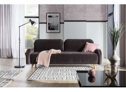 Le luxueux grand canapé-lit est fabriqué en matériau de haute qualité.