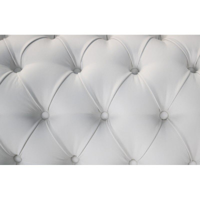 Élégant fauteuil bergère blanc Chesterfield: Le charme du classique dans un style moderne