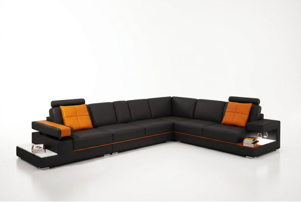 Canapé d'angle moderne en cuir pour salon avec éclairage.