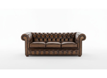 Canapé Chesterfield 3 places rembourré style antique en cuir et tissu.