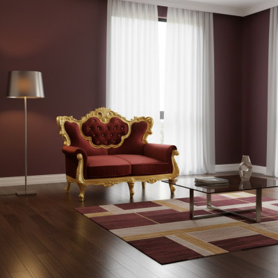 Chic canapé 2 places avec une combinaison de couleurs vives d'un élégant rouge et d'un ton or brillant de style baroque