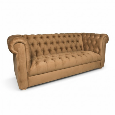 Canapé trois places Chesterfield en cuir.