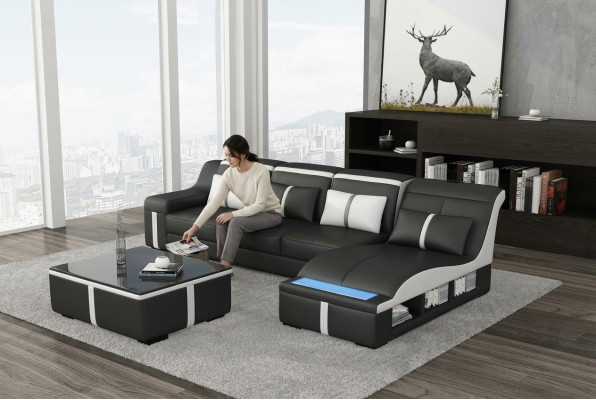 Canapé d'angle design avec USB LED + table. Revêtement en cuir pour salon ou suite de séjour.