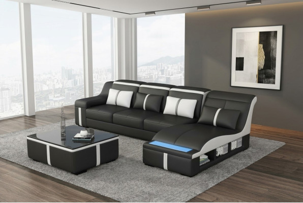 Canapé d'angle design avec USB LED + table. Revêtement en cuir pour salon ou suite de séjour.