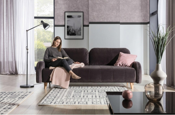 Le luxueux grand canapé-lit est fabriqué en matériau de haute qualité.