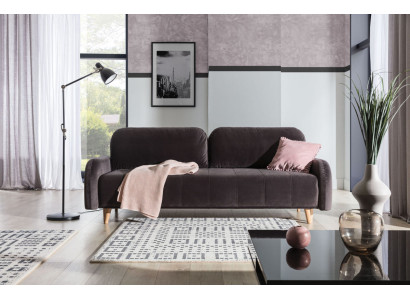 Le luxueux grand canapé-lit est fabriqué en matériau de haute qualité.