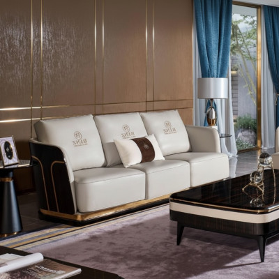 Trois canapés en cuir de designer blancs