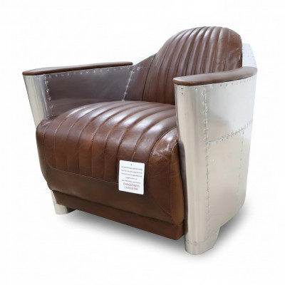 Fauteuil Club de style aviateur en cuir art déco avec finition chrome.