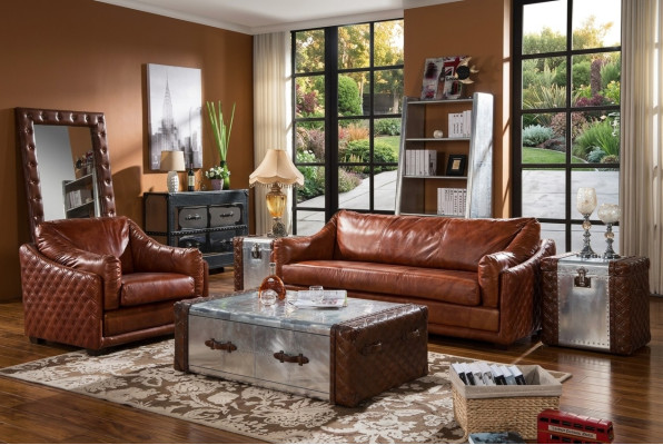 Canapé Chesterfield 3 places en cuir vintage brun dans le style des meubles Chesterfield. Trois places.