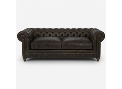 Moderne canapé de luxe noir Chesterfield trois places pour le salon.