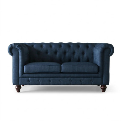 Canapé deux places Chesterfield style anglais en couleurs rose, multicolore, jaune et bleu.