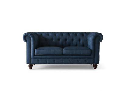 Canapé deux places Chesterfield style anglais en couleurs rose, multicolore, jaune et bleu.