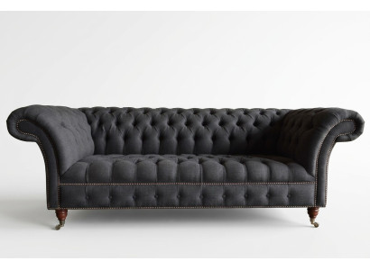 Canapé Chesterfield gris trois places pour un salon de luxe 3 places