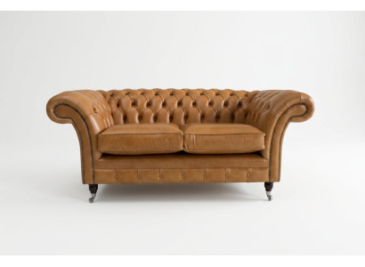 Canapé Chesterfield Design Luxus en tissu et cuir marron.
