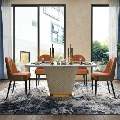 Salle à manger de designer de luxe avec table à manger ronde et 4 chaises inclinables en métal.