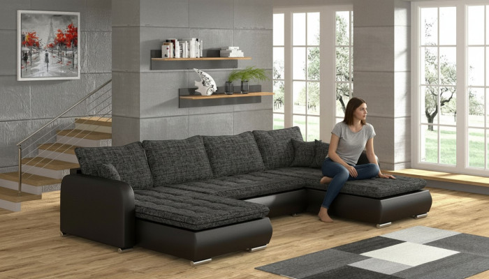 Canapé d'angle design en U avec fonction lit, en cuir et tissu. Nouveau canapé pour un nouvel aménagement de salon.