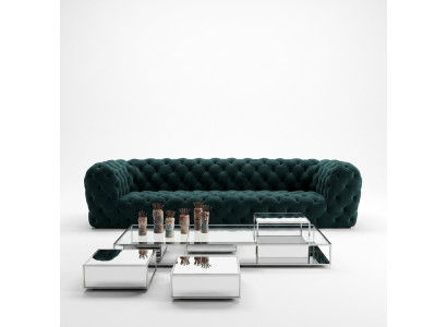 Canapé de club de luxe Chesterfield quatre places XXL pour salon exclusif.