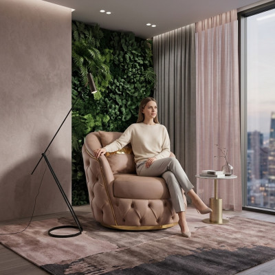 Un fauteuil luxueux et moderne de Chesterfield dans un ton beige clair.