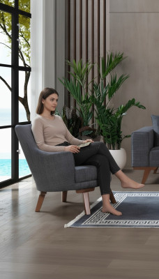Fauteuil de salon design une place moderne en tissu gris.