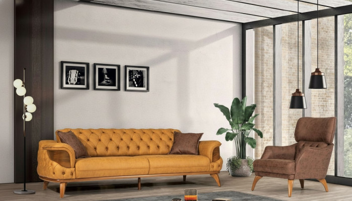 Ensemble de canapés Chesterfield moderne composé de trois canapés-lits de luxe et d'un fauteuil jaune de deux pièces.