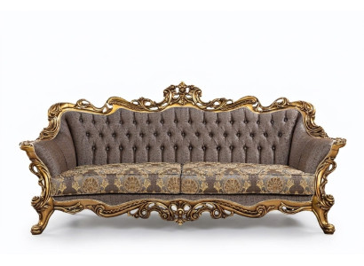 Canapé Chesterfield classique à trois places avec cadre doré.