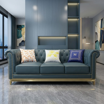 Canapé Chesterfield Trois places en textile avec structure en acier inoxydable