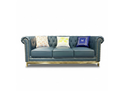 Canapé Chesterfield Trois places en textile avec structure en acier inoxydable