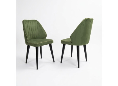 Chaise verte sur des pieds en bois noirs pour la salle à manger, nouveau modèle de confortables.