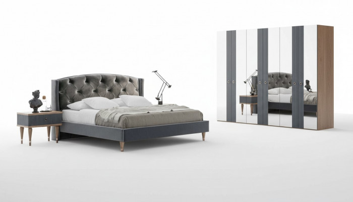 Ensemble de chambre moderne Chesterfield avec lit double designer et tables de chevet.