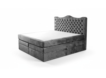 Cadre de lit gris style chesterfield. Design de chambre élégant. Meubles classiques en tissu.