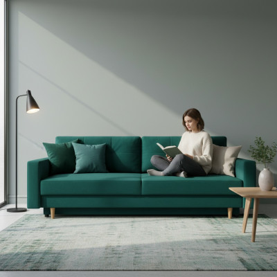 Fonctionnel et méga confortable canapé-lit trois places de luxe en vert.