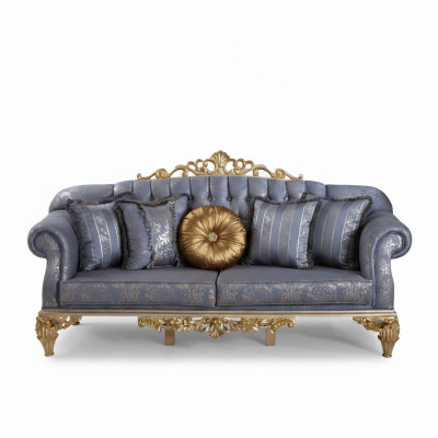 Canapé classique sophistiqué de style Chesterfield pour le salon avec des coussins dorés