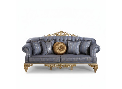 Canapé classique sophistiqué de style Chesterfield pour le salon avec des coussins dorés
