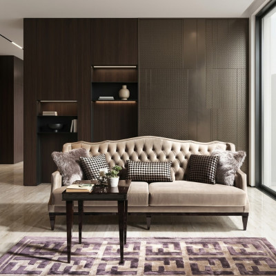 Élégant canapé Chesterfield trois places en gris - meuble rembourré intemporel pour votre maison.