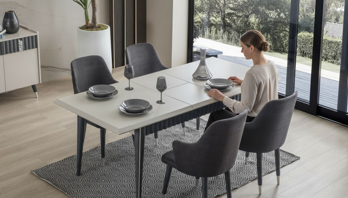 Table à manger rectangulaire blanche design 6 chaises rembourrées grises ensemble de 7 pièces.