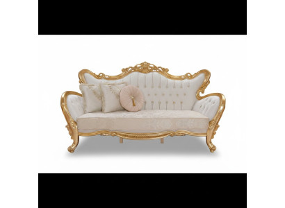 Un canapé luxueux et relaxant de style classique avec des motifs dorés