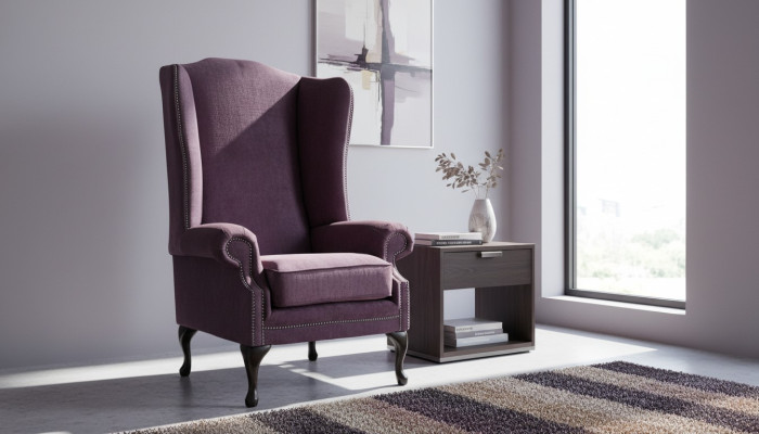 Fauteuil Chesterfield en tissu lounge club rembourré de luxe, de couleur violet, à ailes.