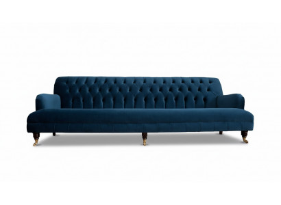 Canapé de designer luxueux de style Chesterfield avec quatre places de couleur bleue.