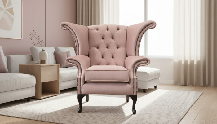 Fauteuil à ailes en velours, canapé rembourré design Chesterfield en tissu.