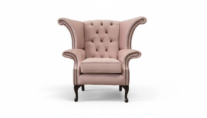 Fauteuil à ailes en velours, canapé rembourré design Chesterfield en tissu.
