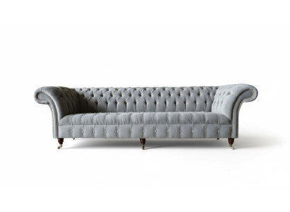 Canapé design Chesterfield 4 places en tissu de luxe.