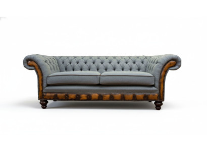 Canapé moderne trois places de luxe gris en tissu textile.