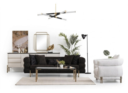 Ensemble de canapé de salon, moderne et luxueux, de designer, composé d'un canapé noir à trois places et d'un fauteuil blanc.