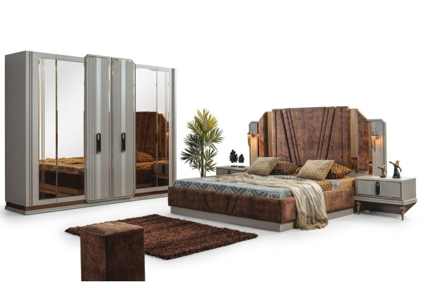 Ensemble de chambre exclusive comprenant un lit double, 2 tables de chevet et une armoire.