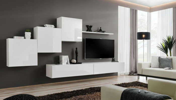 Unité murale blanche avec support TV, buffet, étagères complètes pour salon moderne en bois nouveau.